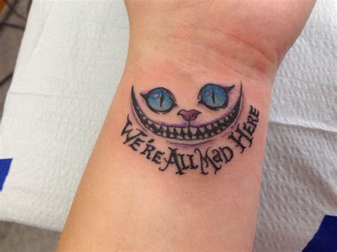 Pin by Leo Evans on Ink | Cheshire cat tattoo, Cool wrist tattoos, Cat ...