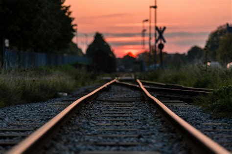 Shallow Focus Photography of Railway during Sunset · Free Stock Photo