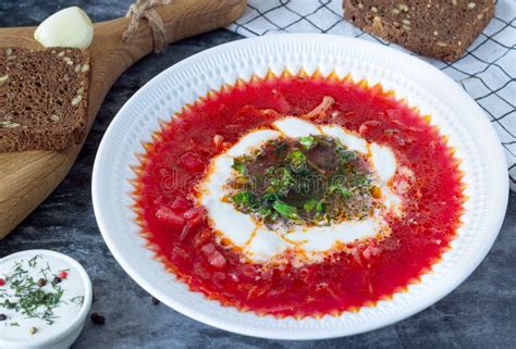 Borsch with Sour Cream and Herbs in a White Plate Stock Photo - Image ...