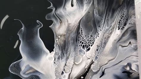 Black, White and Silver dutch pour. The paints are mixed with only water. Beautiful cells due to ...