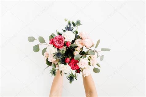 Girl's hands holding beautiful flowers bouquet — Stock Photo © maximleshkovich #158377790