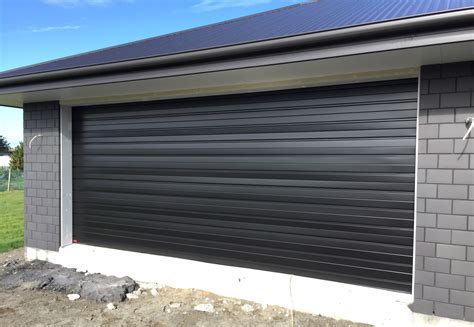 Tremaine Garage Doors | - Dominator Steel Sectional Garage Doors