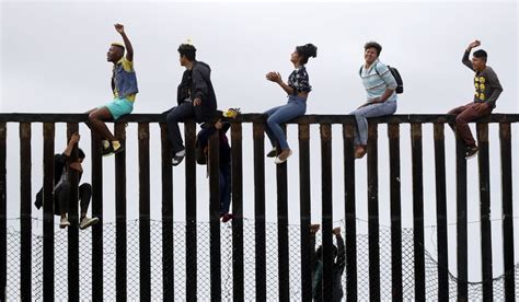 Caravan members arrested after jumping U.S. border - Washington Times