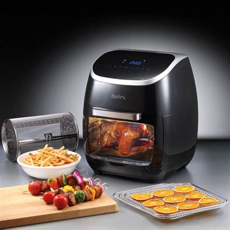 an image of food being cooked in the air fryer with other cooking items around it