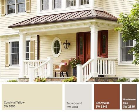 Exterior paint color inspiration. Yellow, navy, cream & red on a ... | House paint exterior ...