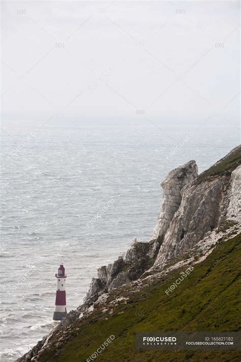 Lighthouse and beachy head — dramatic, beacon - Stock Photo | #165621182