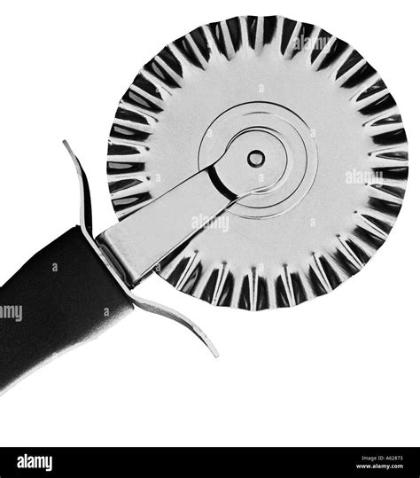 Black and white image of pizza cutter Stock Photo - Alamy