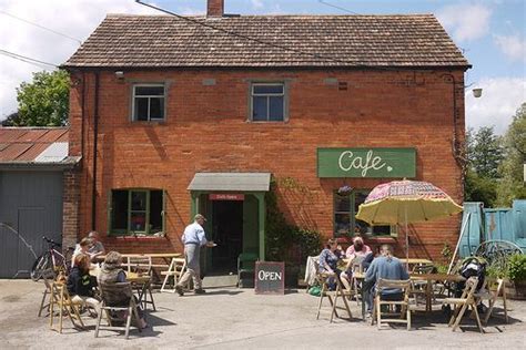 Brick cafe, Red brick exteriors, Exterior decor