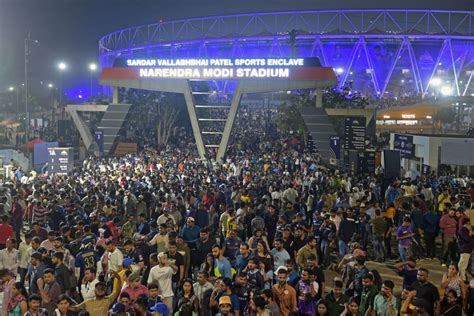 Fans flock out of the Narendra Modi Stadium after a thriller ...