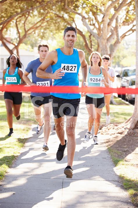 Male Runner Winning Marathon Stock Photo | Royalty-Free | FreeImages