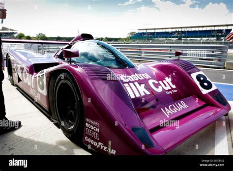 A purple Jaguar Le Mans race car in Silk Cut livery Stock Photo - Alamy