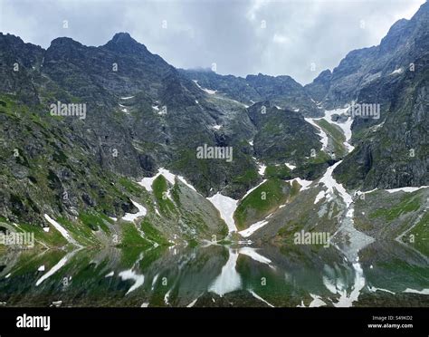 Black Lake below Mount Rysy Stock Photo - Alamy