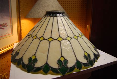 Antique stained glass lamp shade, very heavy. Can be seen at Gillespie Gardens on Facebook Gold ...