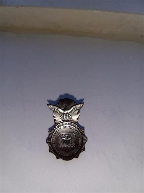 Cop Badge; Lg serialized number