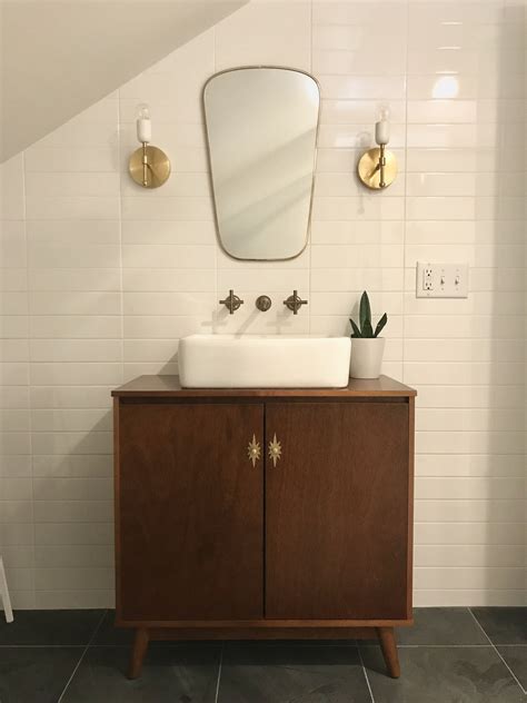 Mid Century modern bathroom renovation with brass sconces | Modern bathroom design, Mid century ...