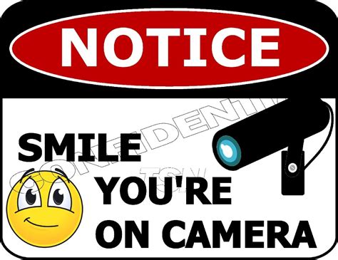 Novelties Notice Smile You're on Camera (v2) Laminated Security Sign sp37