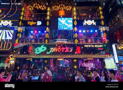 Ho Chi Minh City, Vietnam - April 14, 2019: 86 Pho Tay bar in Bui Vien Street at night. Bui Vien ...