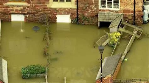 UK weather: Aerial shots reveal severity of flooding from River Severn ...