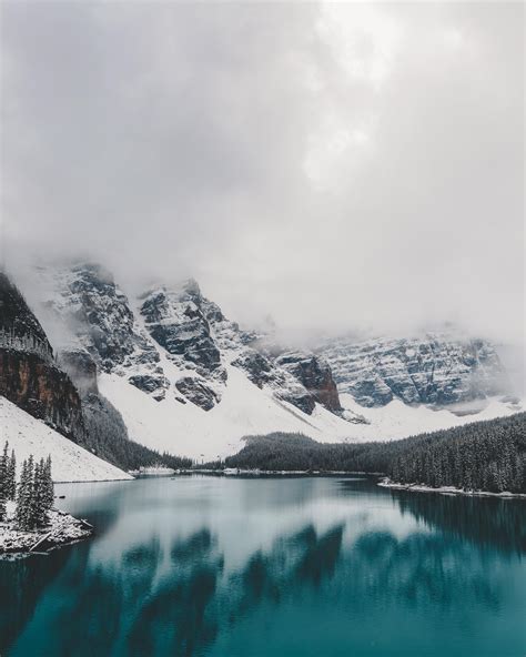 Rare glimpse of Moraine Lake in the winter [2848x3560] - Nature/Landscape Pictures