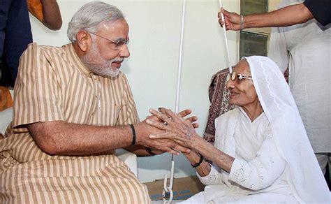 Images: Modi celebrates victory with mother, Keshubhai - Photos News ...