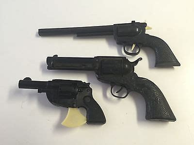 Lot of 3 Vintage Western Toy Guns Colt - Slammer 6-38 - Siren Signal -- Antique Price Guide ...