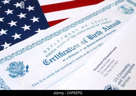 Fs-545 Certification of birth abroad lies on United States flag with ...