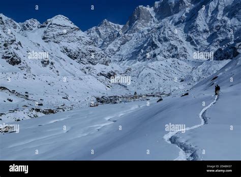 Snow covered Kedarnath temple trek in Himalaya. Kedarnath temple is a Hindu temple dedicated to ...