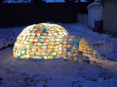 Couple Builds Their Own Multicolored Ice Igloo in Their Backyard