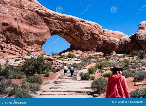 Visitors on a Trail To the North Window Arch in the Windows Section of ...