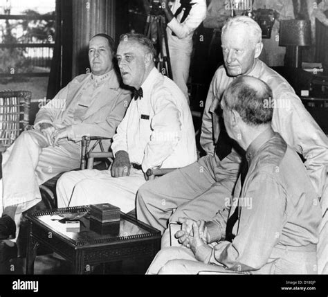 President Franklin Roosevelt at Pearl Harbor on June 11, 1944. L-R: General Douglas Mac Arthur ...