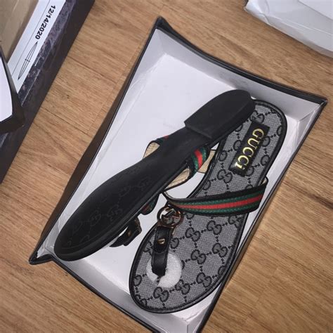 These are Gucci flip flops that have been worn if... - Depop