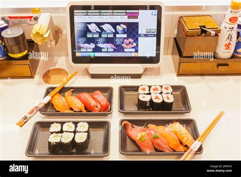 Japan, Honshu, Tokyo, Sushi Restaurant, Touch Screen Conveyor Belt ...