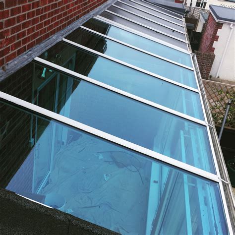 We replaced the old Polycarbonate Roof with Energy Efficient Blue ...