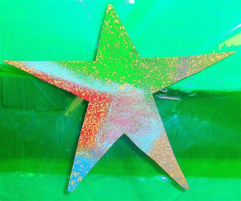Multi-colored Sandpaper Starfish. Created by a second-grade student. | Second grade, Unit plan ...