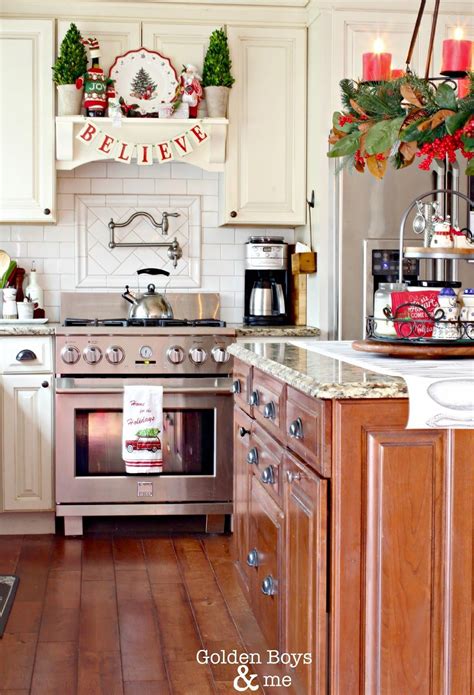 Christmas decor in kitchen with DIY mantel hood and candle chandelier ...