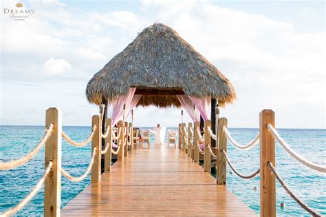 Host an intimate ceremony on the pier surrounded by water and loved ones here at Dreams ...
