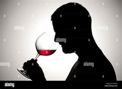 man drinking red wine Stock Photo - Alamy