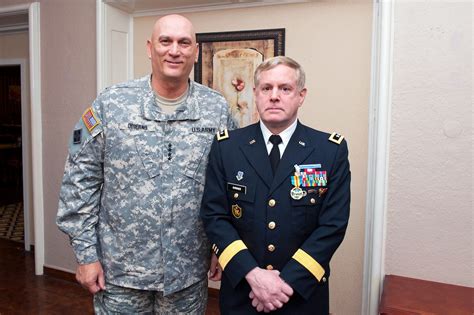 U.S. Army Chief of Staff Gen. Raymond T. Odierno stands next to his West Point classmate, U.S ...