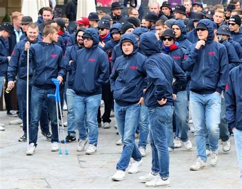 Basel fans arrive for Manchester United Champions League clash… all dressed in identical ...