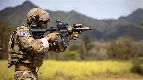 A South Korean UDT/SEAL member conducts a live fire drill during exercise RIMPAC 2022 ...