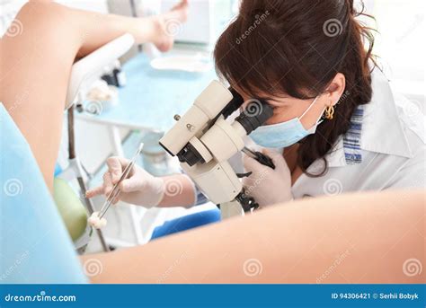 Professional Gynecologist Examining Female Patient On Gynecological ...