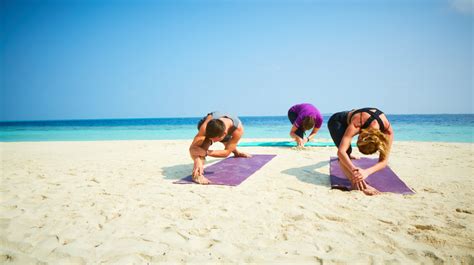 Sunrise Yoga sessions on Dream Island Beach - LATTE Luxury News