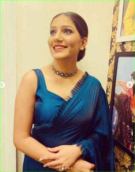 Sapna Chaudhary flaunts her tattoo in a blue sari, check out photos here | NewsTrack English 1