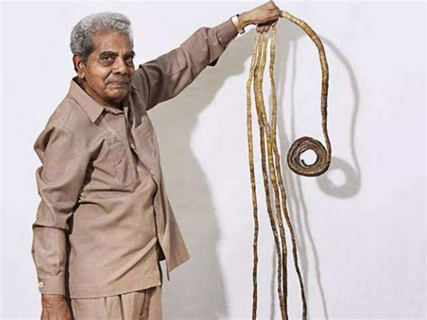 82-year-old Shridhar Chillal with longest nails finally trims them after 66 years | City - Times ...