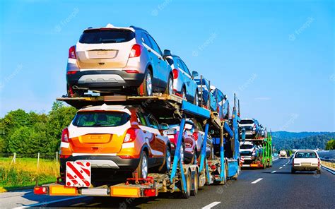 Premium Photo | Cars carrier truck in road or highway of Poland. Lorry transporter at logistics ...