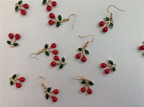 Shop these handmade cherries on my depop :) Cherry Earrings, Hypoallergenic Earrings, Dangly ...