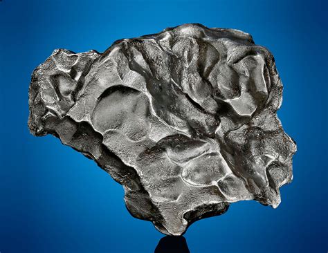 SIKHOTE ALIN METEORITE — AN ENGAGING PALM-SIZED METEORITE, Iron, coarse ...