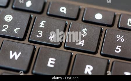 Pound and euro signs Stock Photo - Alamy