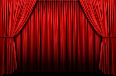 Red stage curtain with arch entrance | The Off Broadway Theatre