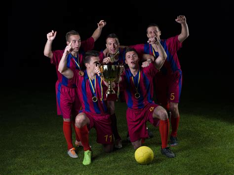 soccer players celebrating victory 11630397 Stock Photo at Vecteezy